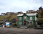 A view shows a wooden building at the port in the settlement of Barentsburg on the Svalbard archipelago