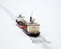 The Taimyr icebreaker leads the Yury Arshenevsky lighter carrier ship along the Yenisei