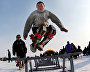 Jumping over dog sleds