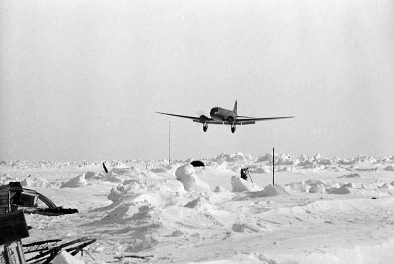 An M-2 airplane landing at the Severny Polis (North Pole) drifting ice station (Soviet research drifting station)