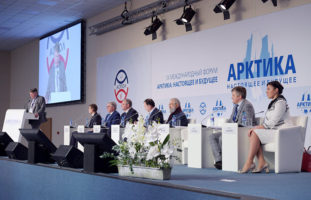 Vice-Governor of St. Petersburg Eduard Batanov, left, speaks at the plenary meeting, Regions as Participants in the Development of the Russian Arctic Zone, held as part of the 9th International Forum The Arctic: Today and the Future, in St. Petersburg