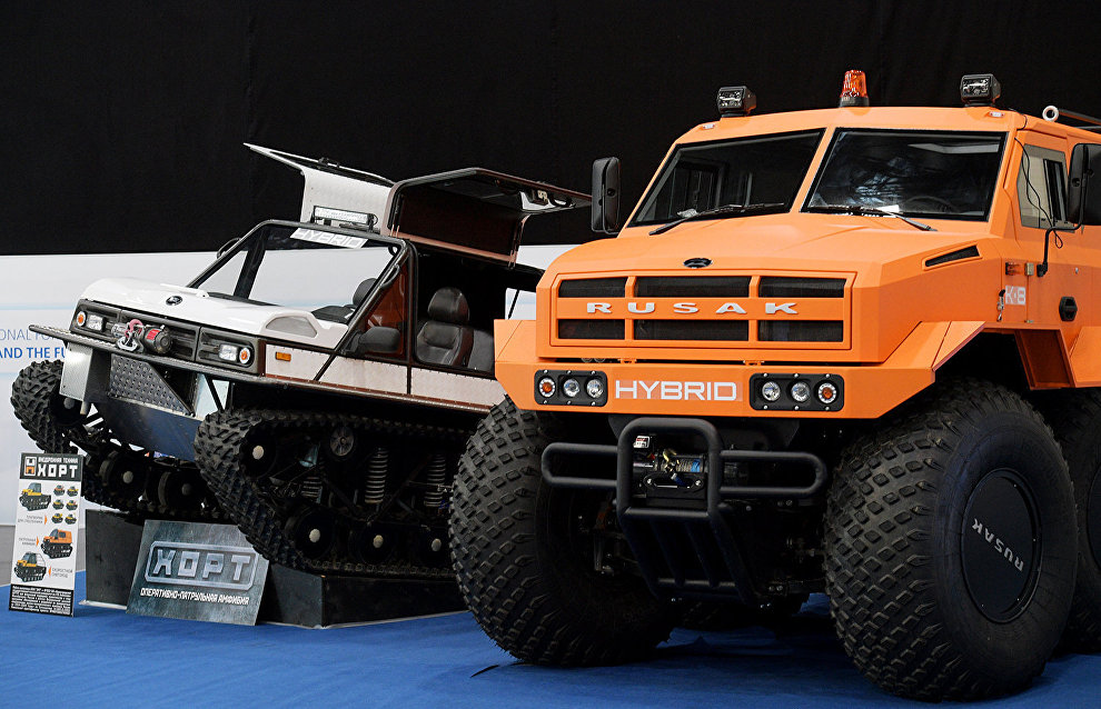 The Russian-made Hort-3918 ATV, left, and the Rusak Zёma 8x8 ATV displayed at the 9th International Forum The Arctic: Today and the Future, in St. Petersburg