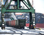 Loaded trains enter the port by rail. The cranes can load up to 80 tons in a ship