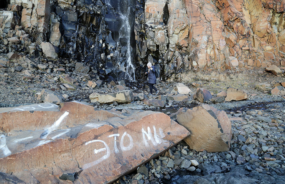 Activists tried to clean graffiti off the cliffs, but didn’t have enough time to finish this during the warm season. They plan to continue next year