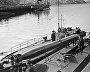 Торпедный катер принимает на борт боеприпасы перед выходом на боевое задание. Северный флот